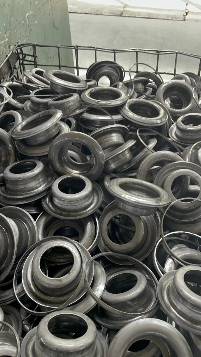 Batch of stamped steel housing components