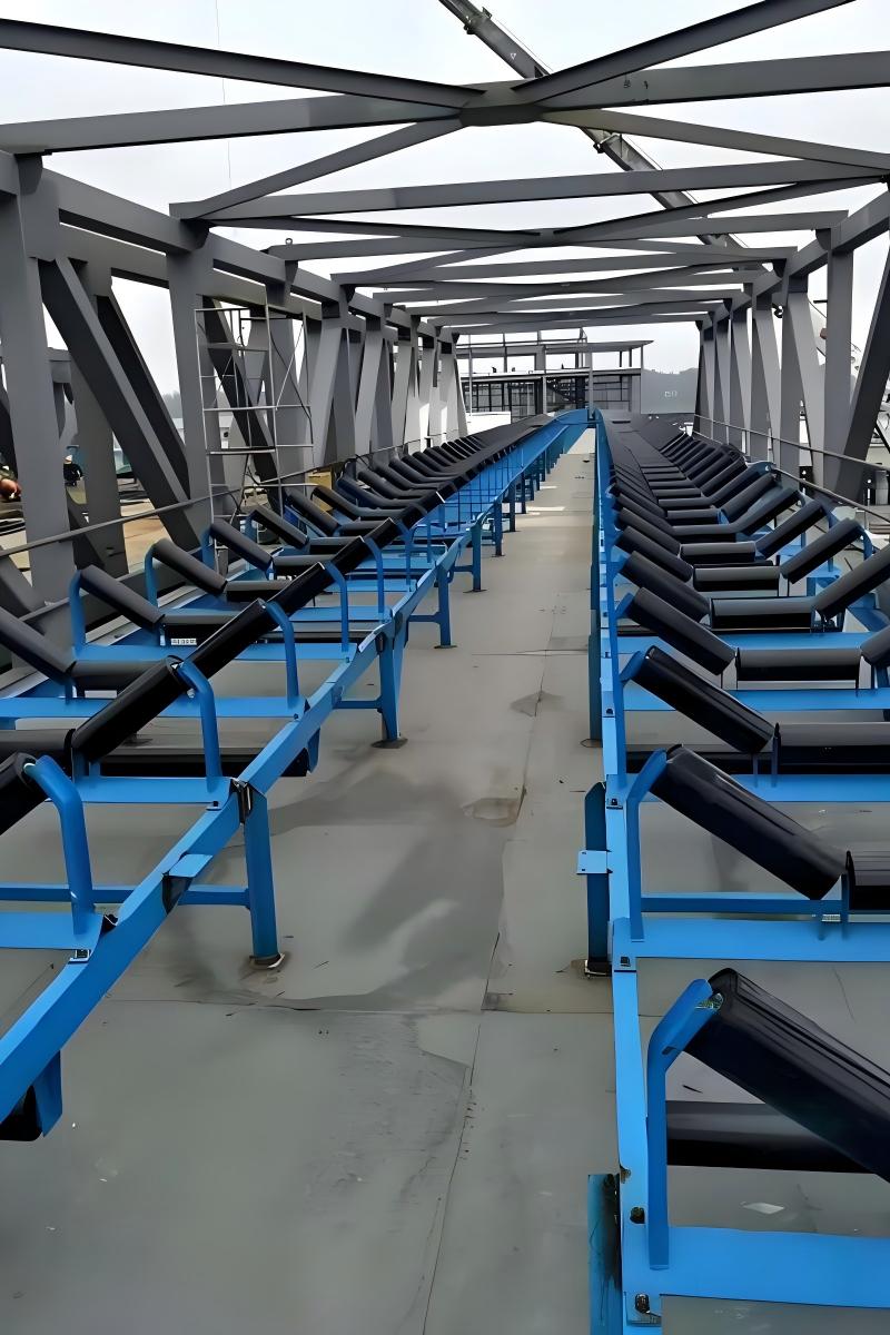 Conveyor roller installation in an industrial facility